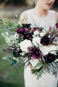 Shot of Molly's white and wine colored bouquet