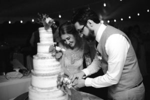 Matthew and Molly cutting their cake
